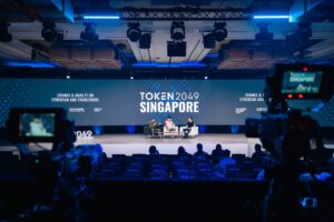 cdc Zoomex Ignites TOKEN2049: Mainstage Talk with F1 Driver and Side Event Defines “Trading as Payment” Trend